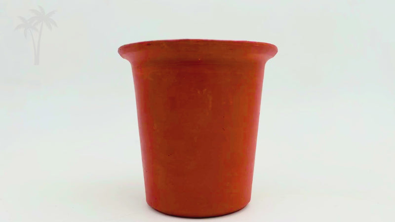 Handmade terracotta clay tumbler for drinking water and traditional beverages, featuring natural cooling properties and artisan craftsmanship.
